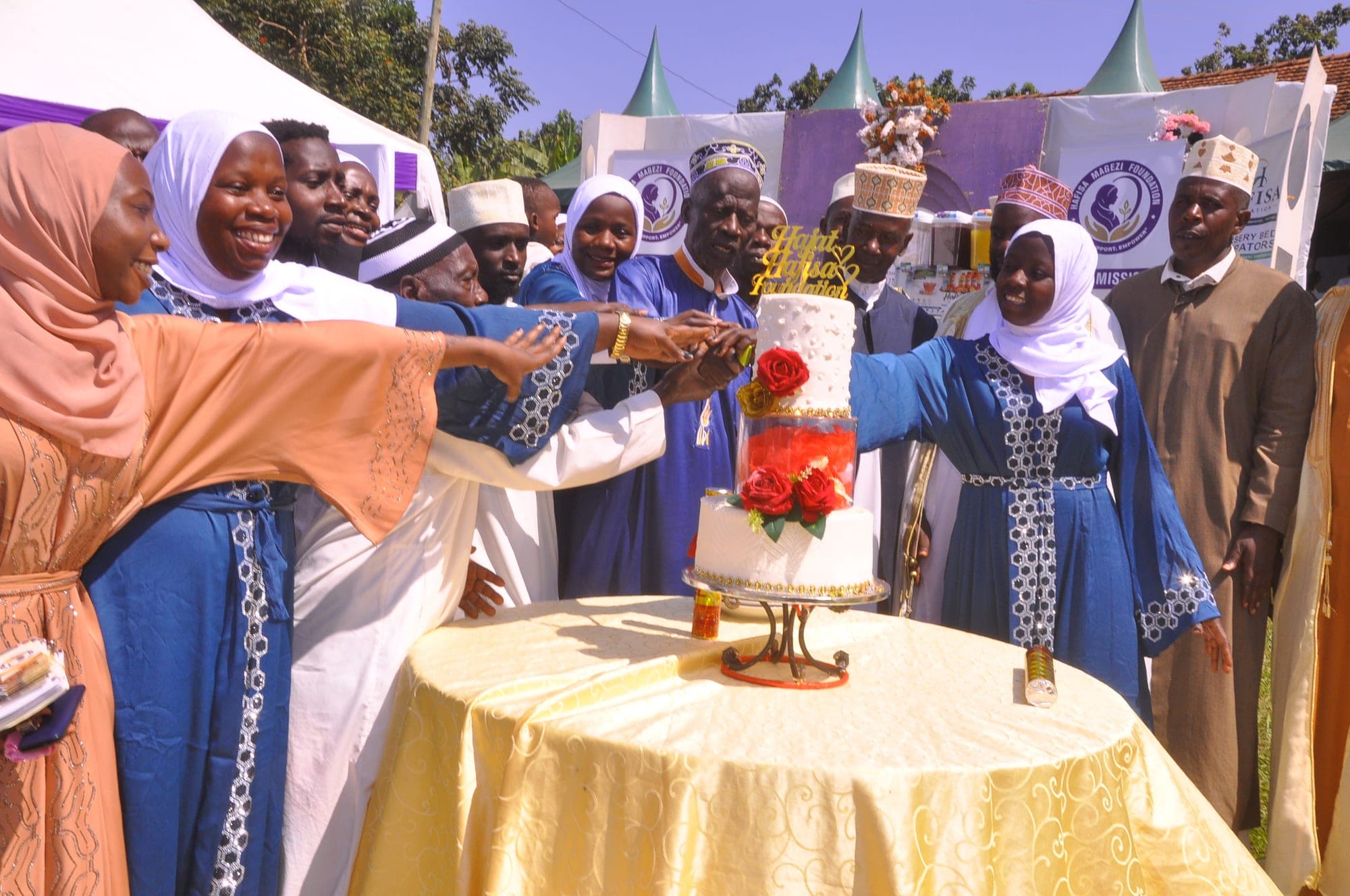 Joyful celebration around the foundation cake